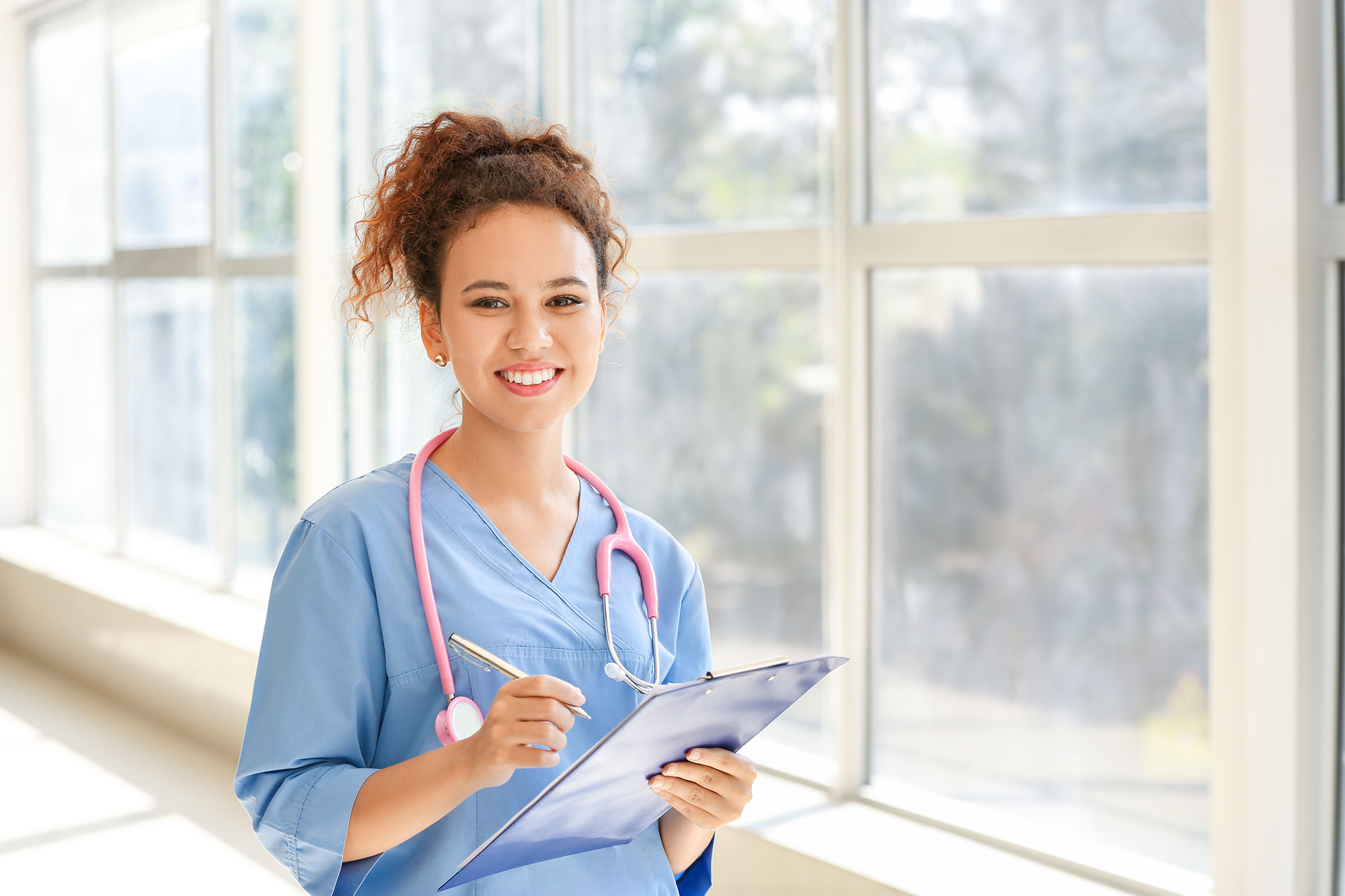 Continuing Education Hero Image - Female Nurse with Stethoscope - Swedish Institute - New York, NY